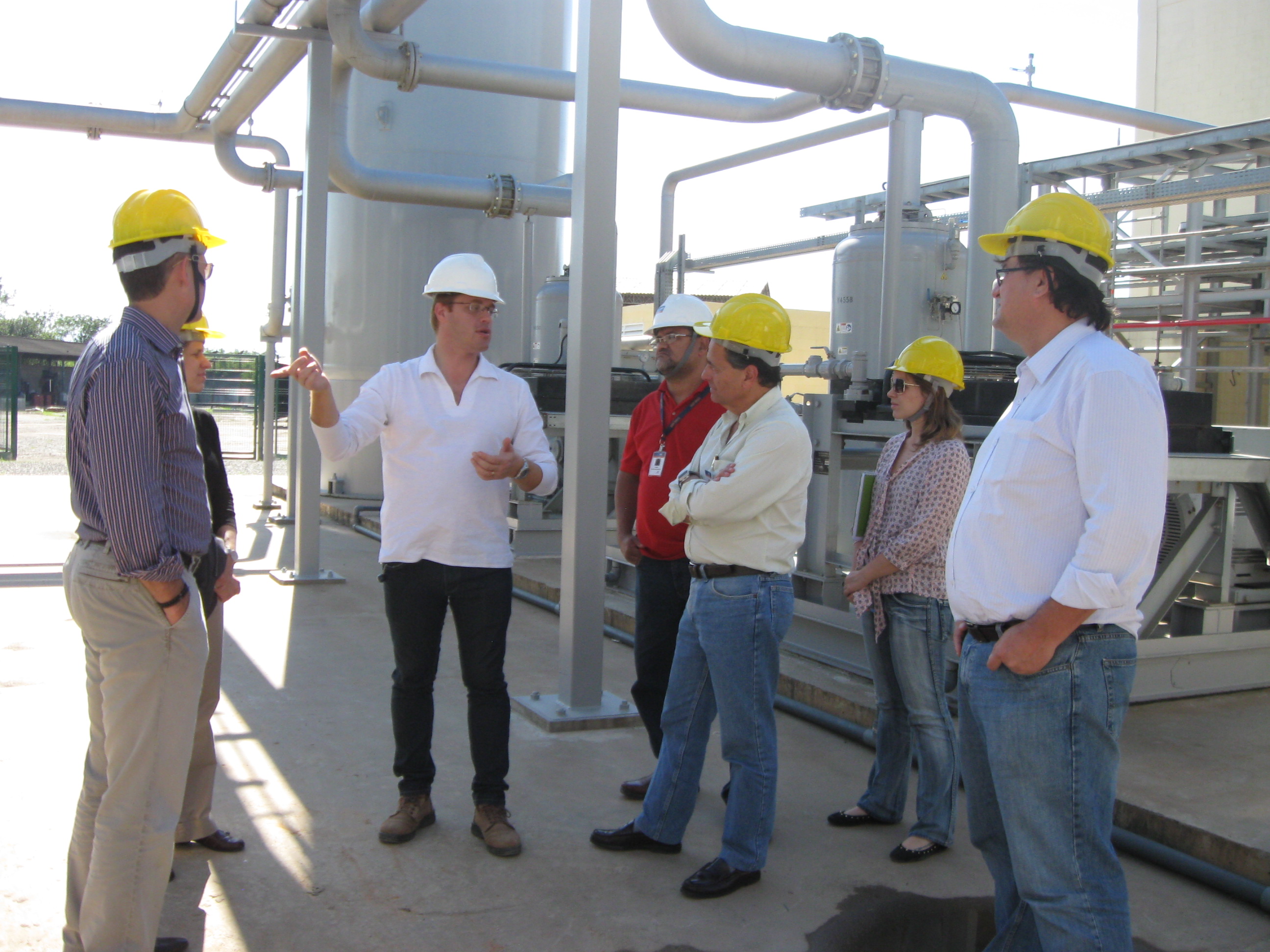 Officials tours the LFG purification and compression skid at the Gramacho Landfill in Brazil.
